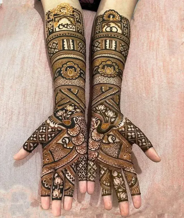 Traditional full-arm mehendi design by Anand Mehendi & Tattoo, Bhubaneswar