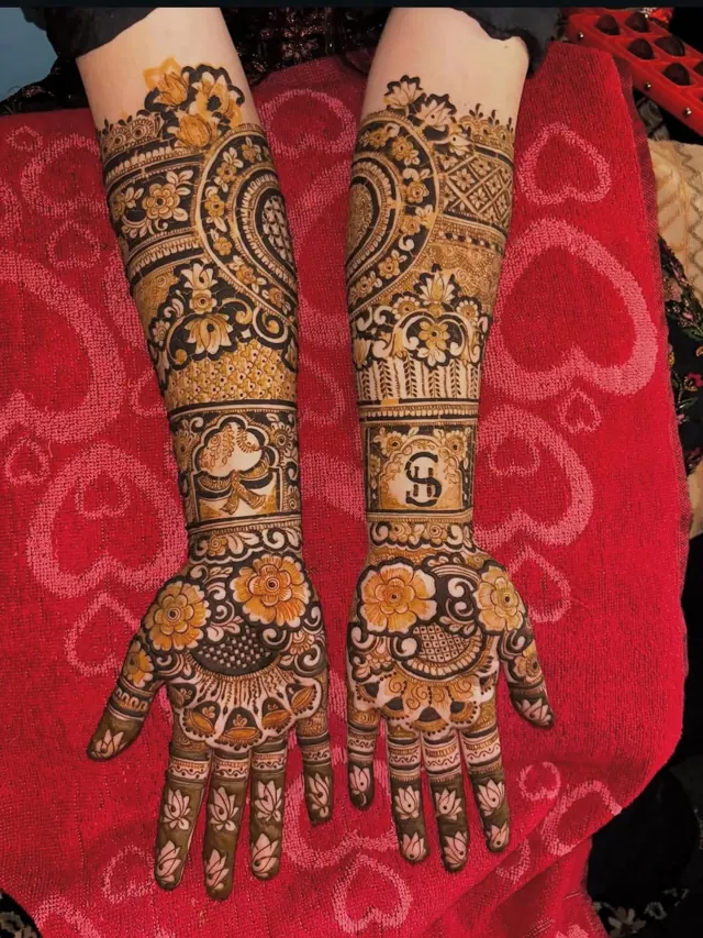 Traditional full-arm mehendi design by Anand Mehendi & Tattoo, Bhubaneswar
