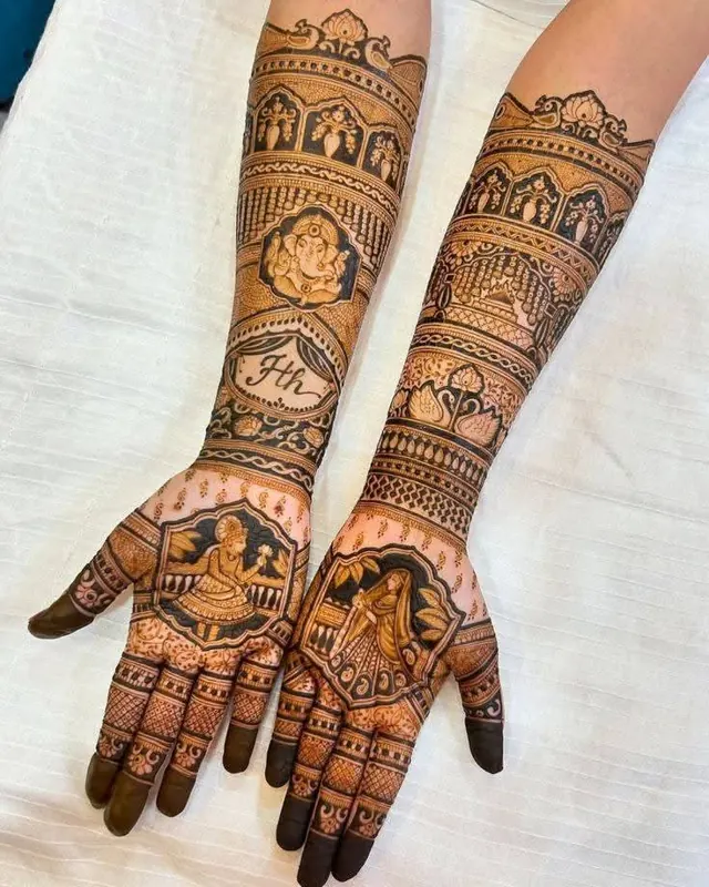 Traditional full-arm mehendi design by Anand Mehendi & Tattoo, Bhubaneswar
