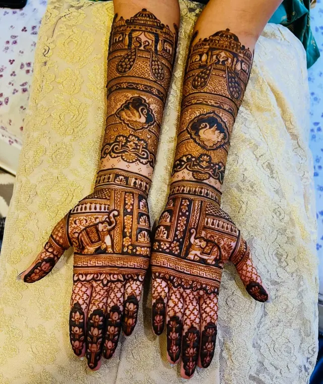Traditional full-arm mehendi design by Anand Mehendi & Tattoo, Bhubaneswar