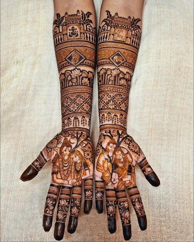 Detailed bridal mehendi design on both arms by Anand Mehendi & Tattoo, Bhubaneswar