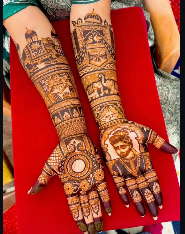Detailed bridal mehendi design on both arms by Anand Mehendi & Tattoo, Bhubaneswar