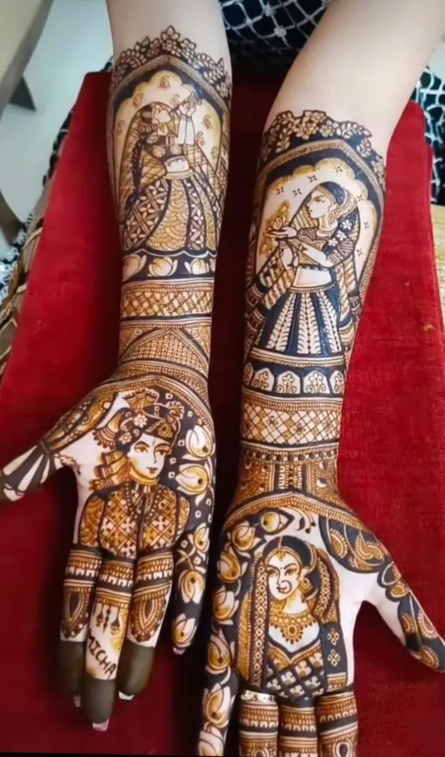 Detailed bridal mehendi design on both arms by Anand Mehendi & Tattoo, Bhubaneswar