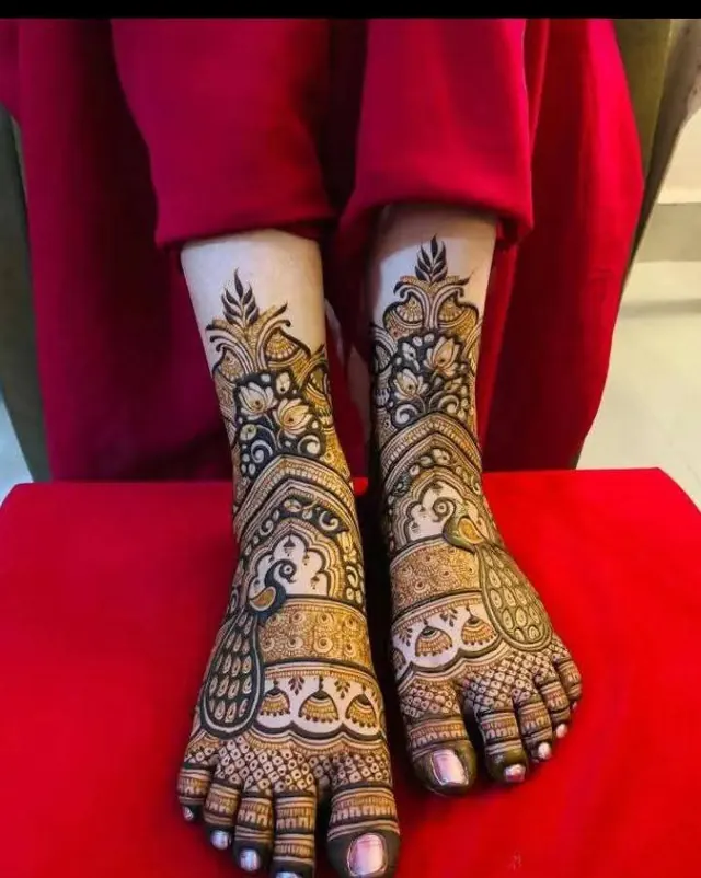Bridal mehendi design on feet by Anand Mehendi & Tattoo, Bhubaneswar