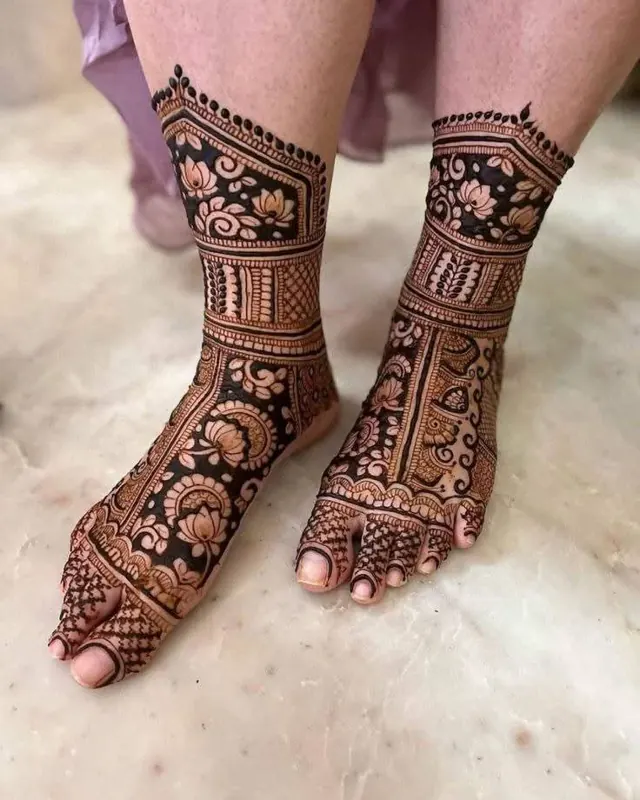 Bridal mehendi design on feet by Anand Mehendi & Tattoo, Bhubaneswar